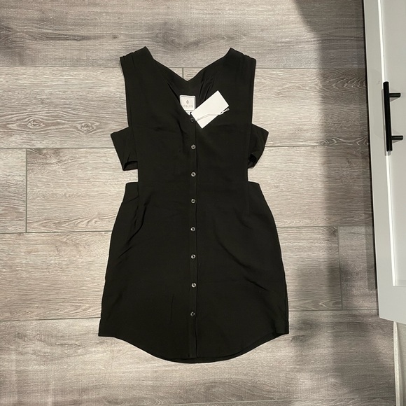 Cosette Dresses & Skirts - Black button up dress